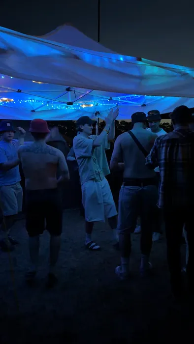 Festival tent bathed in light