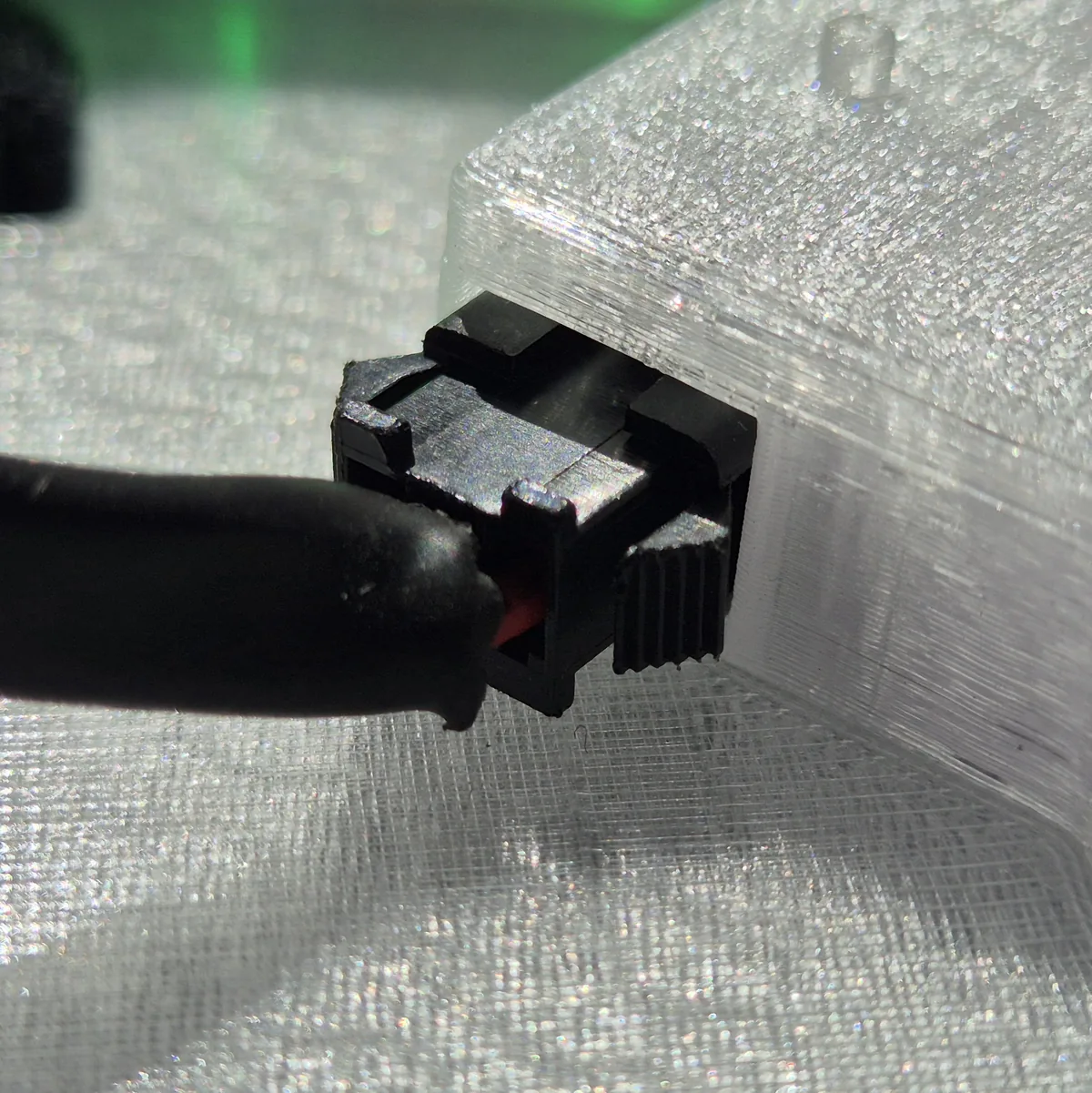 The connector from the 5m light string plugged into the JST port on the Party UFO