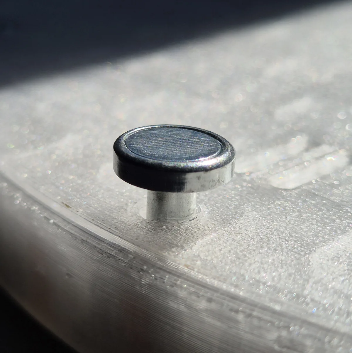 Magnets screwed into the M4 threads on the underside of the Party UFO